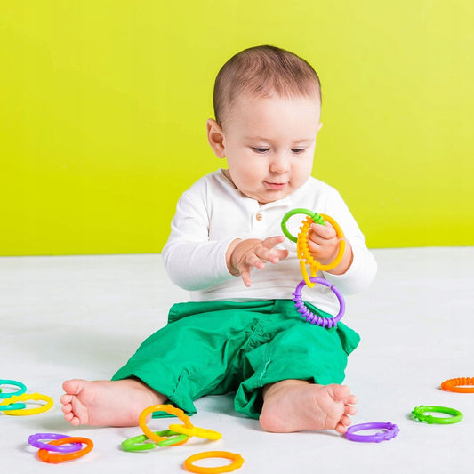 BRIGHT STARTS bunte Ringe zum Spielen und zum Befestigen von Spielzeug