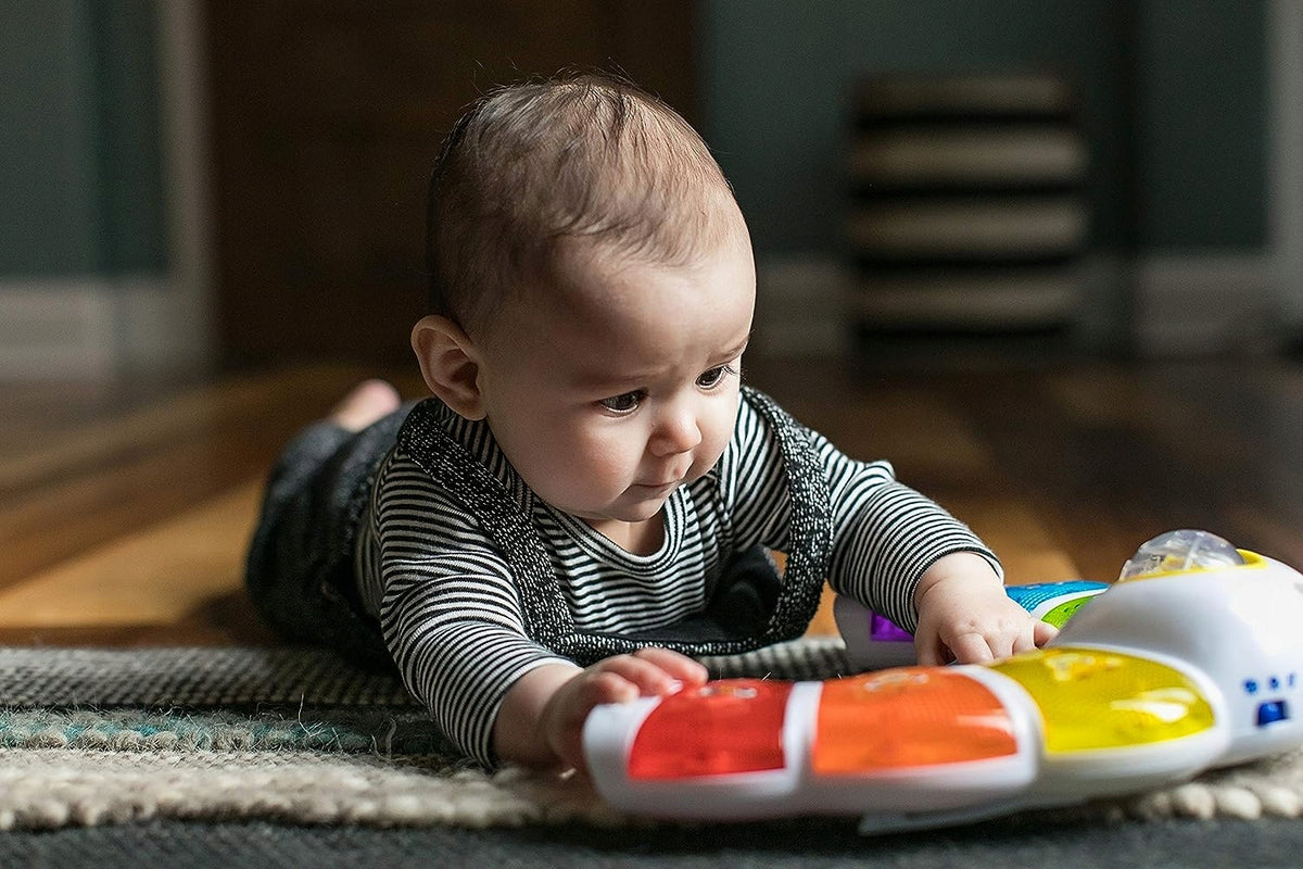 BABY EINSTEIN Leuchtpanel mit Rassel, Melodien und Wörtern in 3 Sprachen