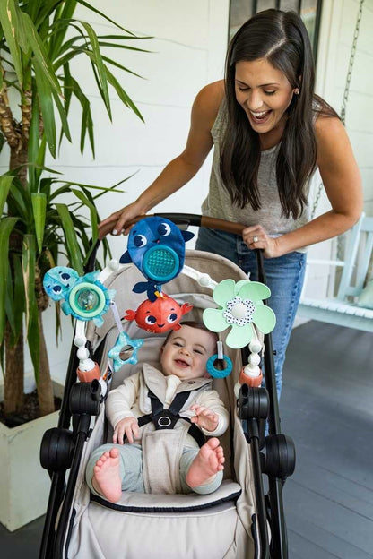 TINY LOVE Ozean-Schätze Musikbogen für Kinderwagen