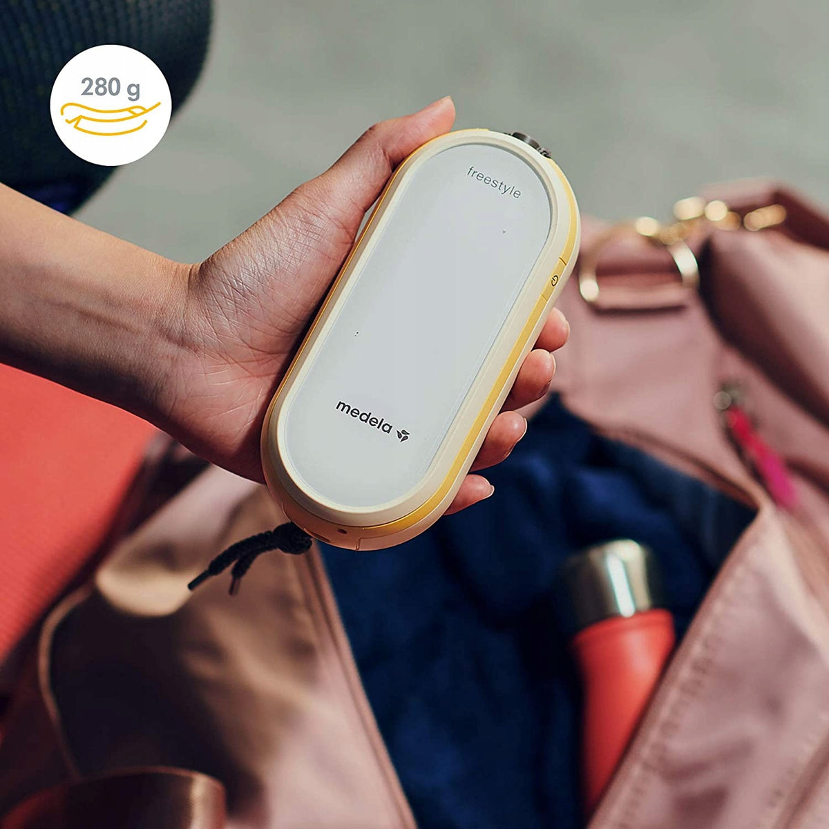 MEDELA Freestyle Flex podwójny LAKTATOR 2-fazowy, lekki 280 g, przenośny elektryczny laktator w kolorze żółtym